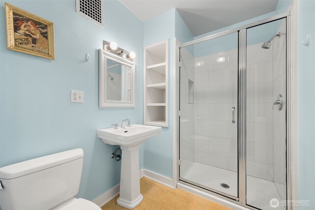746 10th Ave E, Seattle, WA 98102 - bathroom with toilet, visible vents, and a stall shower