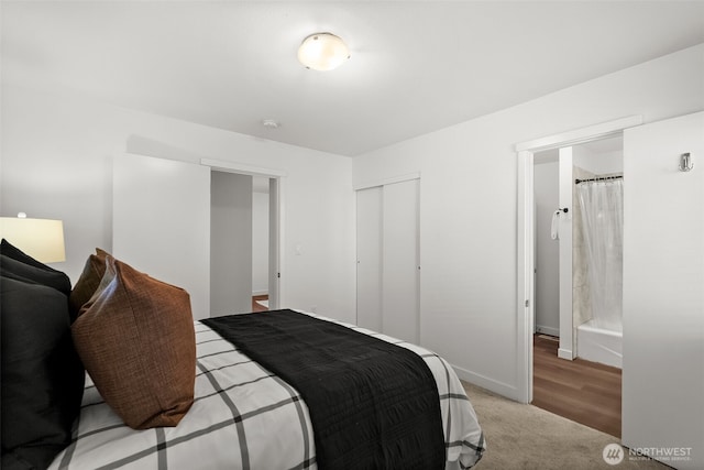 4822 S M St, Tacoma, WA 98408 - bedroom featuring a closet, baseboards, and carpet floors