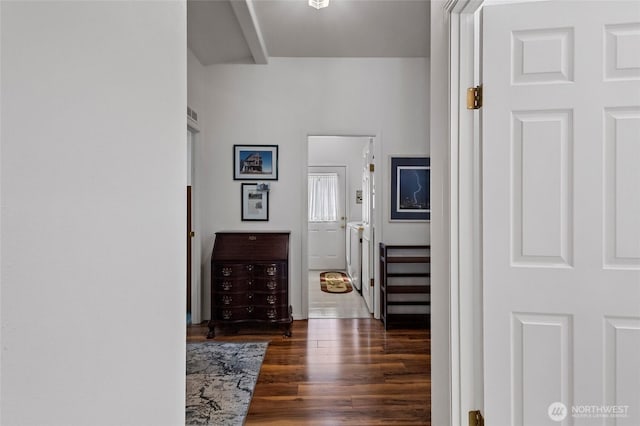 entryway with dark wood-style floors