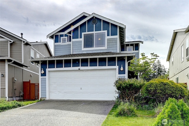 2824 187th St E, Tacoma, WA 98445 - view of front of property with concrete driveway and a garage