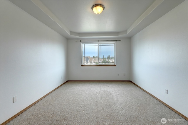 2824 187th St E, Tacoma, WA 98445 - carpeted empty room featuring a raised ceiling and baseboards
