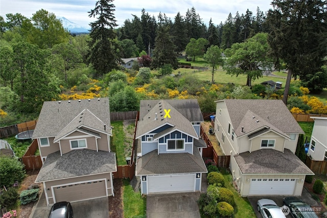 2824 187th St E, Tacoma, WA 98445 - aerial view of residential area with a forest