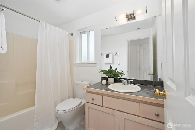 bathroom with toilet, vanity, and shower / bathtub combination with curtain