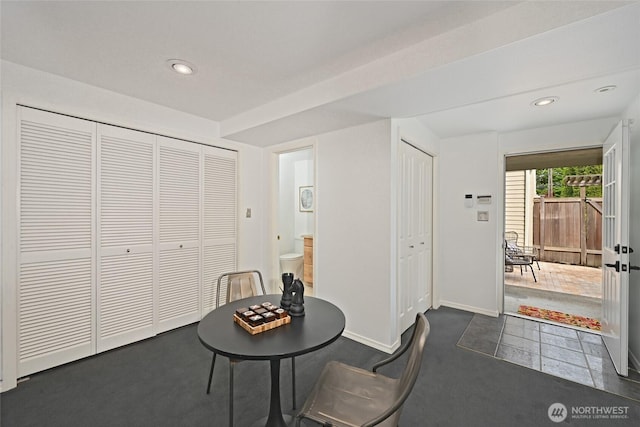 dining room featuring baseboards and recessed lighting