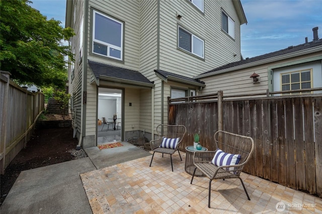 view of patio featuring a fenced backyard