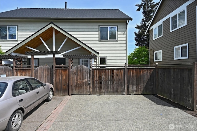 view of front of house with a pergola