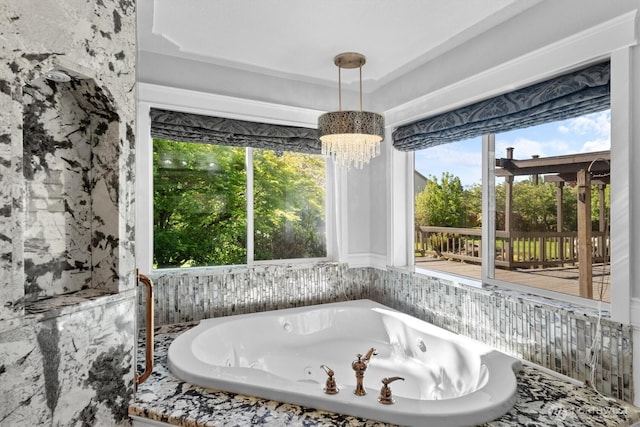 2350 38th Ave, Longview, WA 98632 - bathroom featuring a jetted tub and a chandelier