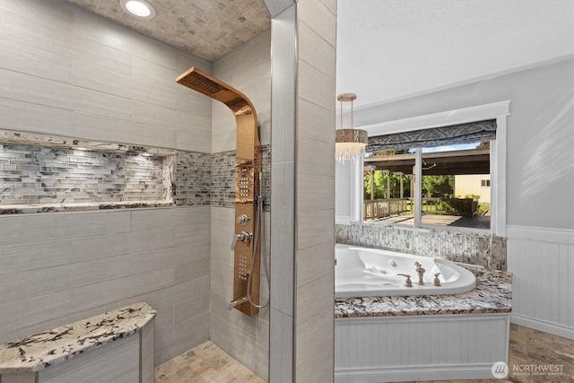 2350 38th Ave, Longview, WA 98632 - full bathroom featuring tiled shower, a tub with jets, and wainscoting