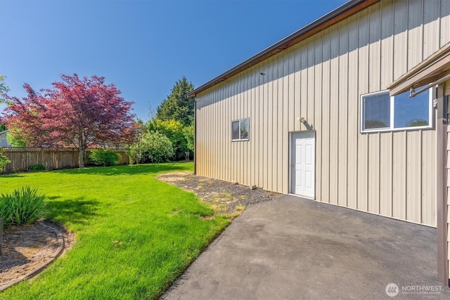 2350 38th Ave, Longview, WA 98632 - view of property exterior featuring a patio area and board and batten siding