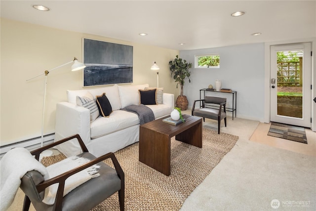 living room featuring light carpet, recessed lighting, and baseboard heating