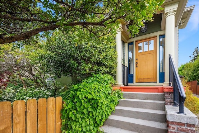 property entrance with fence
