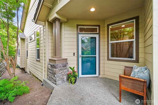 doorway to property featuring a porch