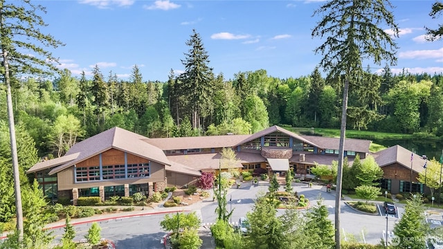 view of property with a view of trees