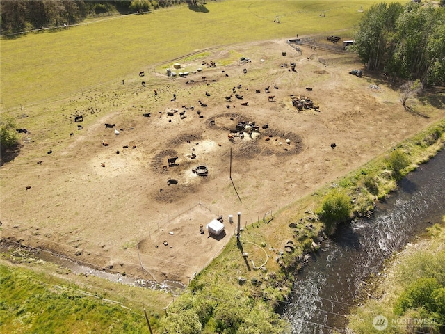birds eye view of property featuring a rural view