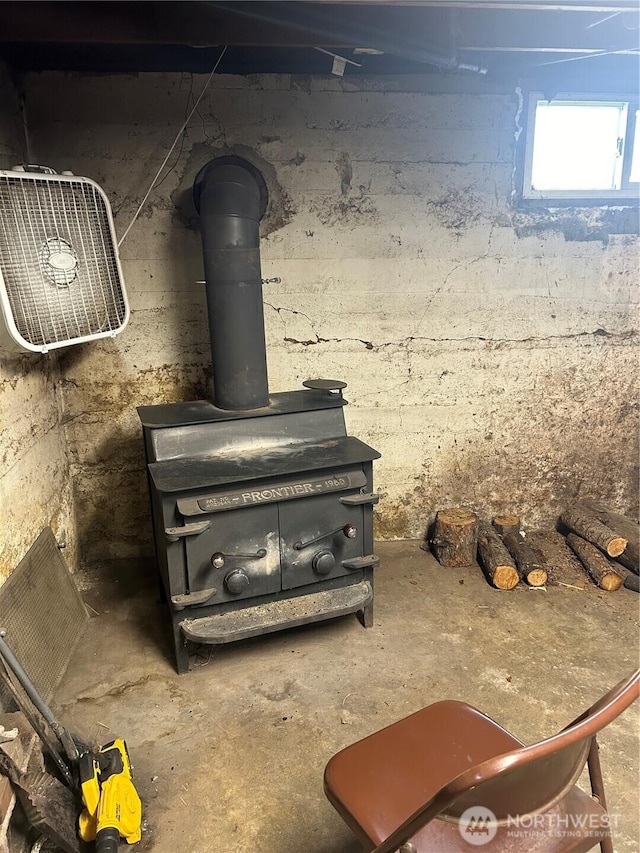 113 Baileysburg Ln, Dayton, WA 99328 - basement view of concrete floors and a wood stove