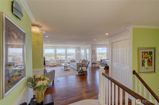 1005 346th Pl, Ocean Park, WA 98640 - living area featuring healthy amount of natural light, crown molding, recessed lighting, and wood finished floors