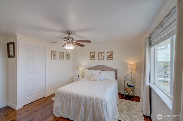 1005 346th Pl, Ocean Park, WA 98640 - bedroom featuring wood finished floors, baseboards, ornamental molding, and a ceiling fan