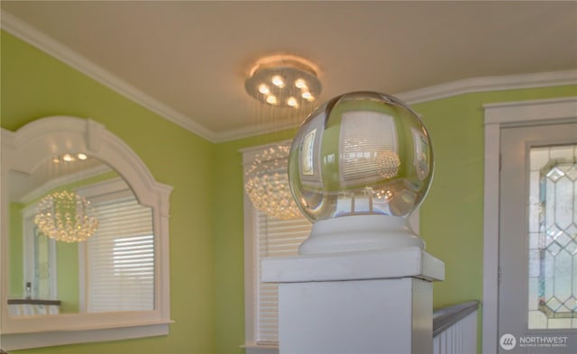 1005 346th Pl, Ocean Park, WA 98640 - clothes washing area featuring a chandelier and ornamental molding