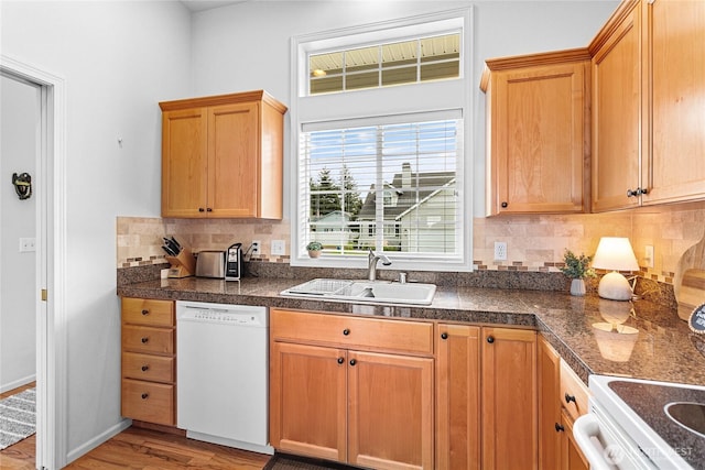 1725 Harrison Pl Unit 103, Lynden, WA 98264 - kitchen featuring dishwasher, a sink, light wood finished floors, tasteful backsplash, and tile countertops