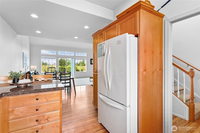 1725 Harrison Pl Unit 103, Lynden, WA 98264 - kitchen with freestanding refrigerator, tile counters, light wood-style floors, and recessed lighting