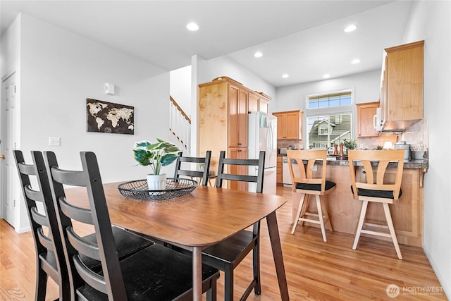 1725 Harrison Pl Unit 103, Lynden, WA 98264 - dining room with light wood-type flooring, stairway, and recessed lighting