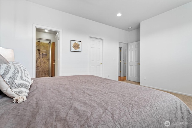 1725 Harrison Pl Unit 103, Lynden, WA 98264 - carpeted bedroom featuring recessed lighting, connected bathroom, and baseboards