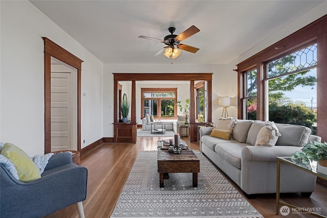 3301 Mckinley Ave, Tacoma, WA 98404 - living room featuring baseboards, ceiling fan, and wood finished floors