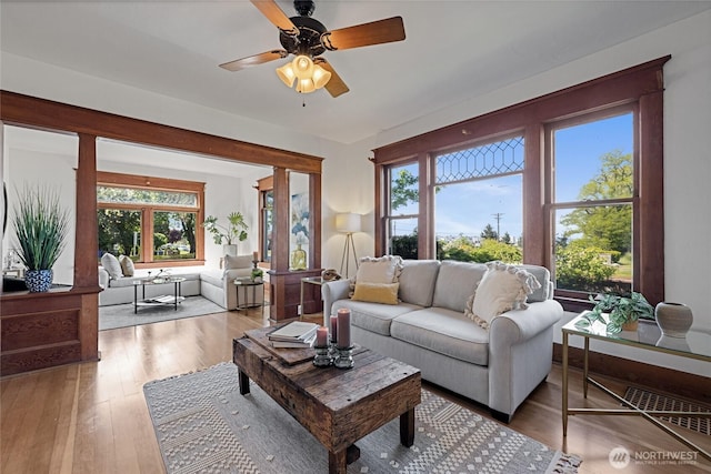 3301 Mckinley Ave, Tacoma, WA 98404 - living room featuring ceiling fan, wood-type flooring, plenty of natural light, and visible vents