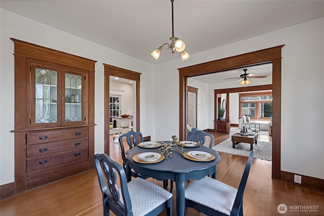 3301 Mckinley Ave, Tacoma, WA 98404 - dining space with baseboards, french doors, a ceiling fan, and wood finished floors