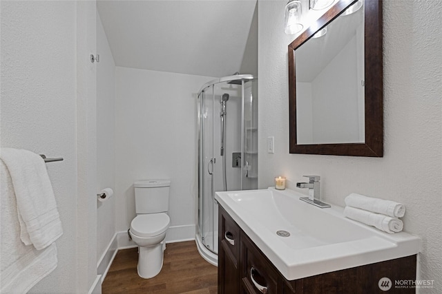 3301 Mckinley Ave, Tacoma, WA 98404 - full bath featuring vanity, toilet, a shower stall, and wood finished floors