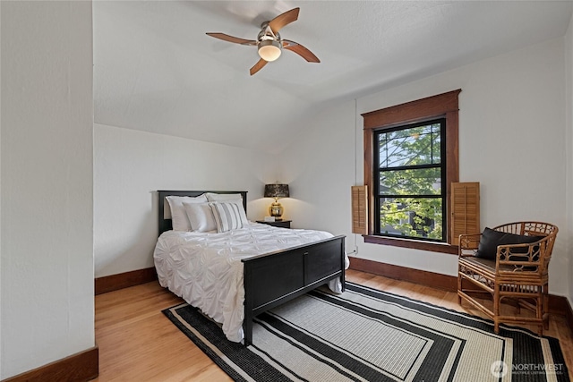 3301 Mckinley Ave, Tacoma, WA 98404 - bedroom featuring ceiling fan, lofted ceiling, baseboards, and light wood-style floors