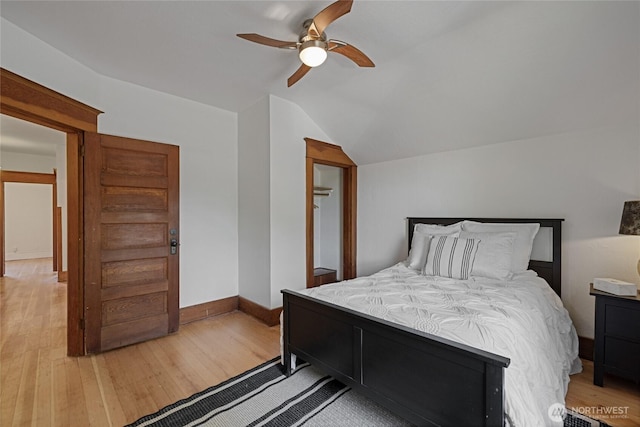3301 Mckinley Ave, Tacoma, WA 98404 - bedroom with light wood-style floors, vaulted ceiling, baseboards, and a ceiling fan