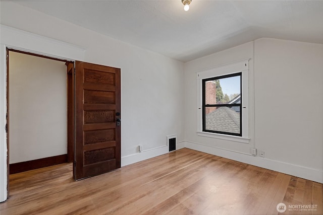 3301 Mckinley Ave, Tacoma, WA 98404 - interior space featuring baseboards, light wood-style floors, visible vents, and vaulted ceiling