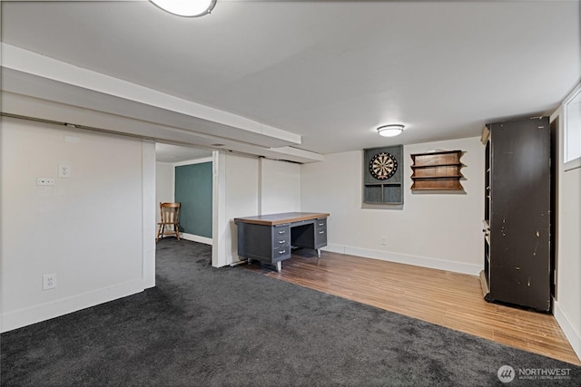 3301 Mckinley Ave, Tacoma, WA 98404 - finished below grade area with baseboards, dark colored carpet, and dark wood-style floors