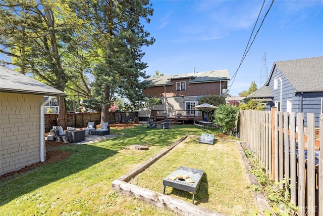 3301 Mckinley Ave, Tacoma, WA 98404 - view of yard featuring a fenced backyard, an outdoor hangout area, and a wooden deck