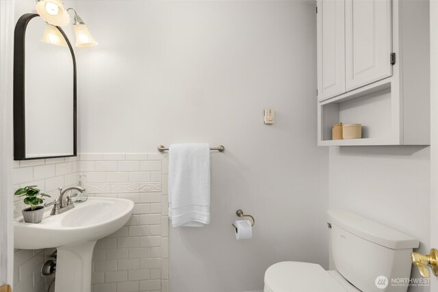 half bathroom with toilet
