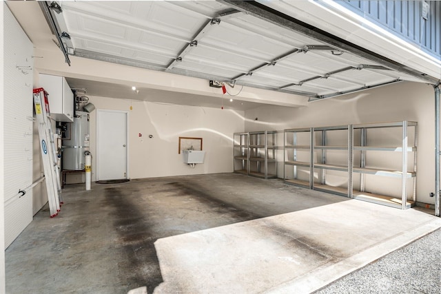 garage with strapped water heater
