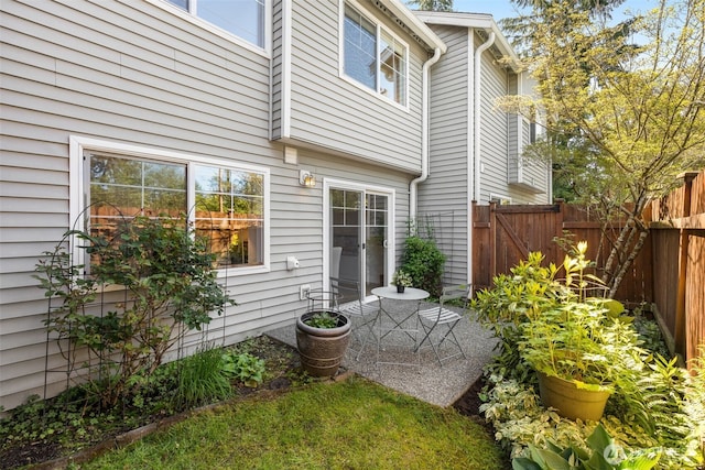 back of house featuring fence and a patio