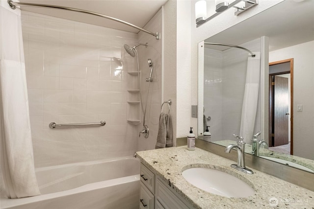 bathroom featuring vanity and shower / bath combo with shower curtain