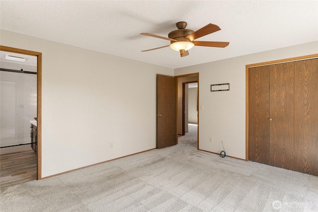 unfurnished bedroom featuring ceiling fan, light carpet, a closet, and baseboards