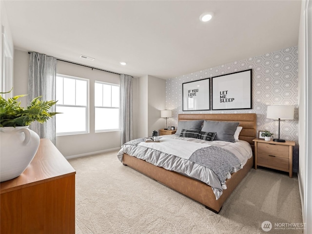 carpeted bedroom with baseboards, recessed lighting, visible vents, and wallpapered walls