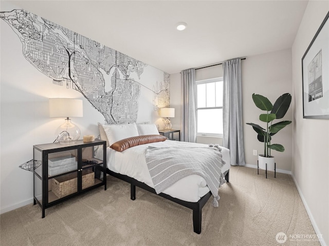 bedroom featuring baseboards and carpet floors