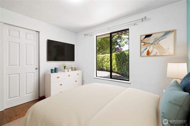 bedroom featuring wood finished floors