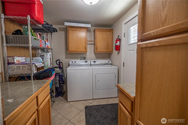 878 SW Hunter Ave, Quincy, WA 98848 - laundry room with separate washer and dryer, cabinet space, and light tile patterned floors