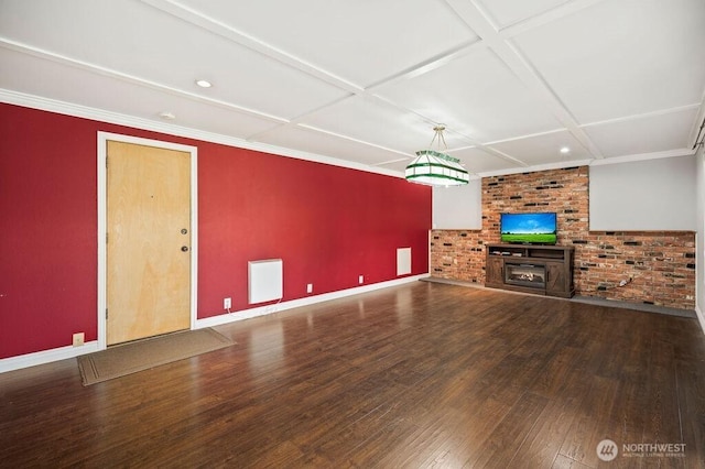 17919 3rd Ave NE, Arlington, WA 98223 - unfurnished living room featuring wood-type flooring, baseboards, a fireplace, coffered ceiling, and recessed lighting