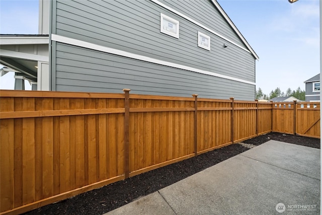 exterior space featuring a fenced backyard