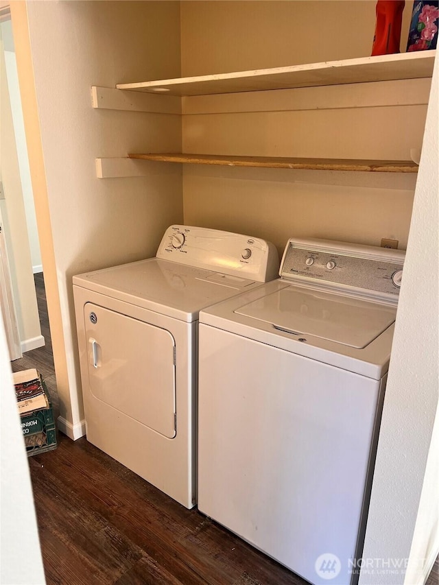laundry room featuring separate washer and dryer and dark wood-style flooring