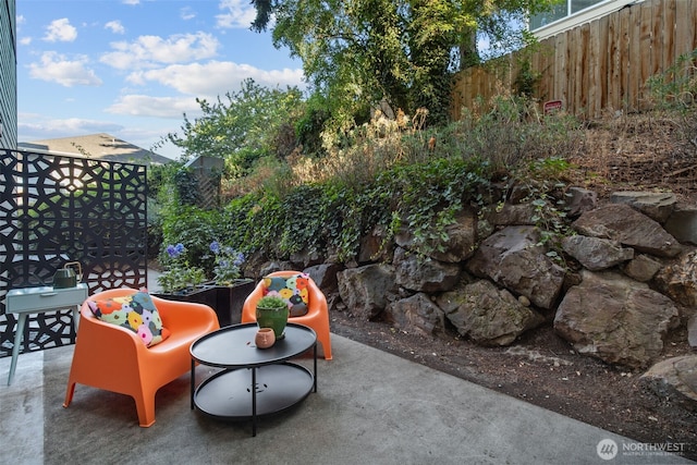 view of patio / terrace with fence