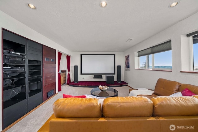 4538 Somerset Dr SE, Bellevue, WA 98006 - carpeted home theater room featuring a textured ceiling, visible vents, and recessed lighting