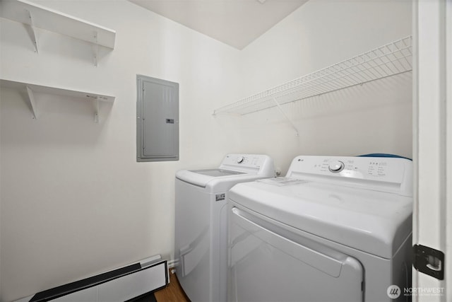 clothes washing area with electric panel, a baseboard heating unit, independent washer and dryer, and dark wood-style flooring